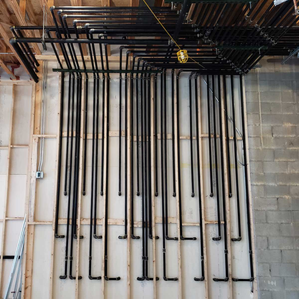 Custom meter manifold for a residential gas piping system